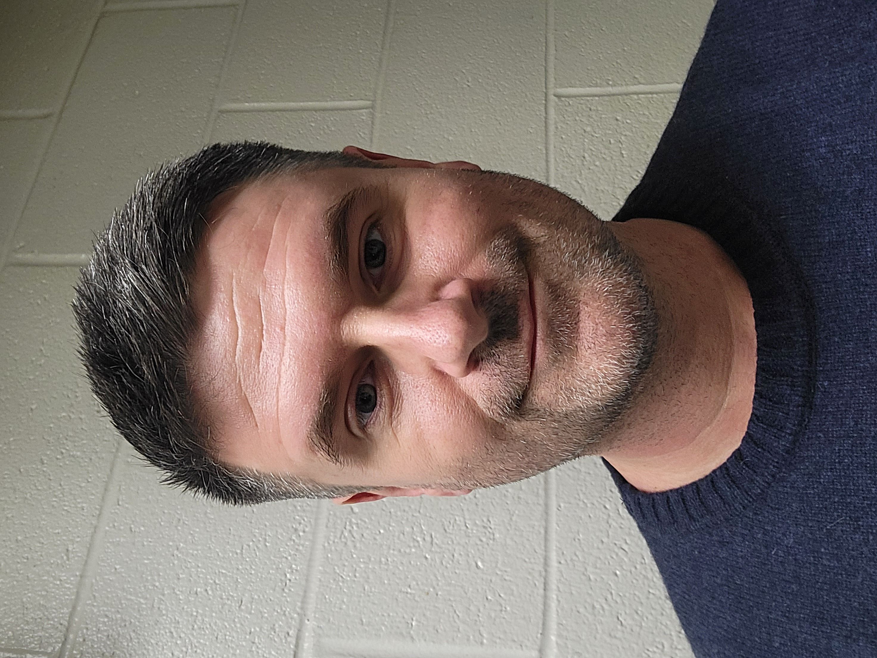 Photograph of the most incredibly handsome software engineer you can imagine. Trust me, he puts Adonis to shame.